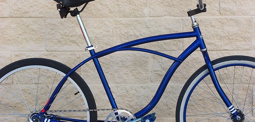 bicycle leaning on wall