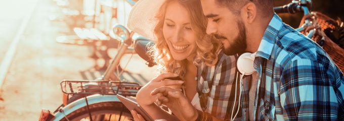 couple looking at tablet